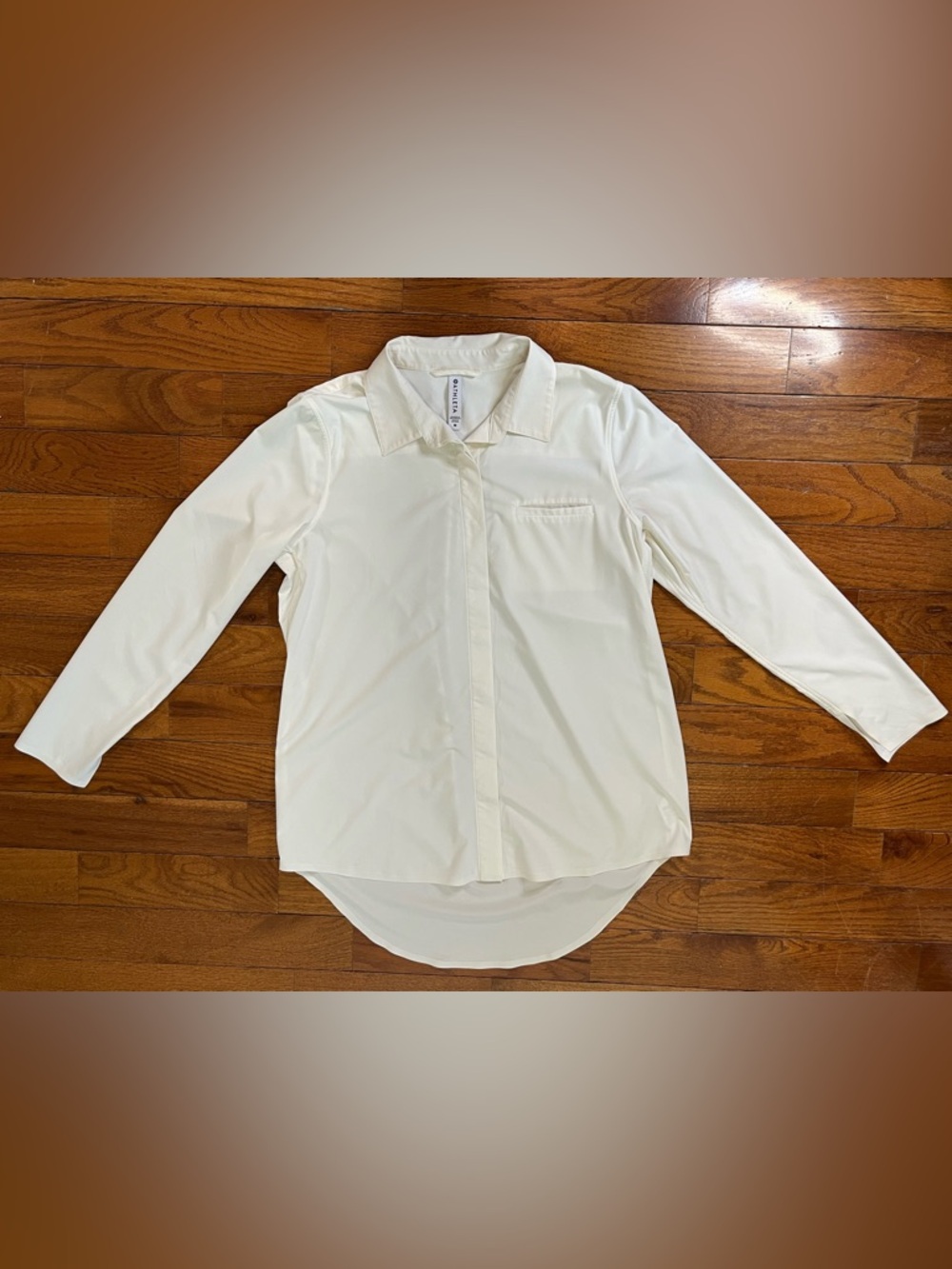 Athleta Cream Button Front Blouse Women’s M Stretch High Low Hem